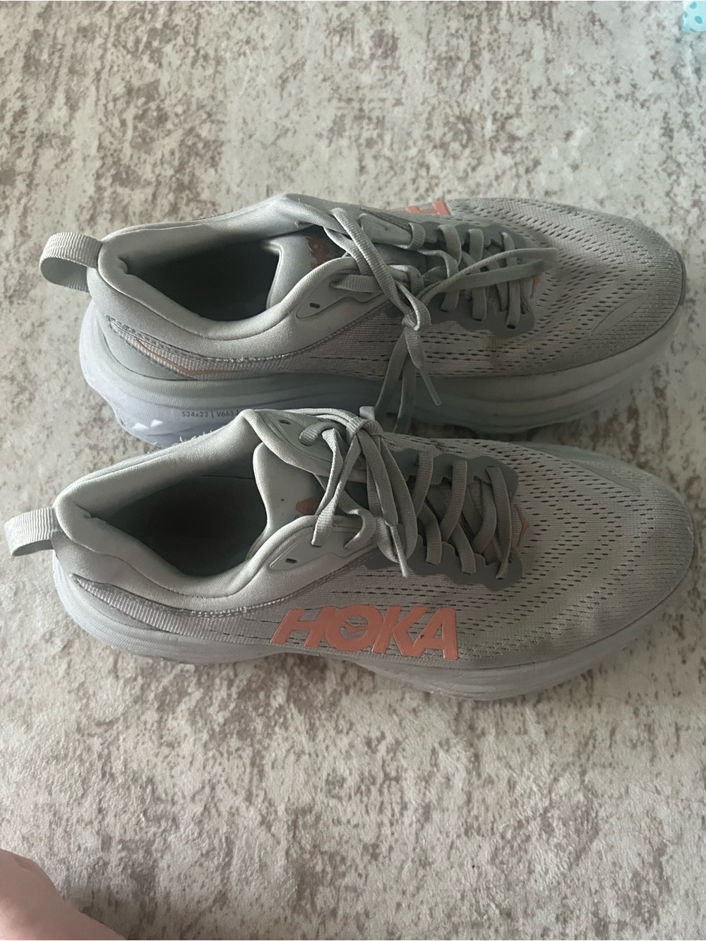 HOKA Women’s Clifton 8 Gray Running Shoes with Coral Logo
